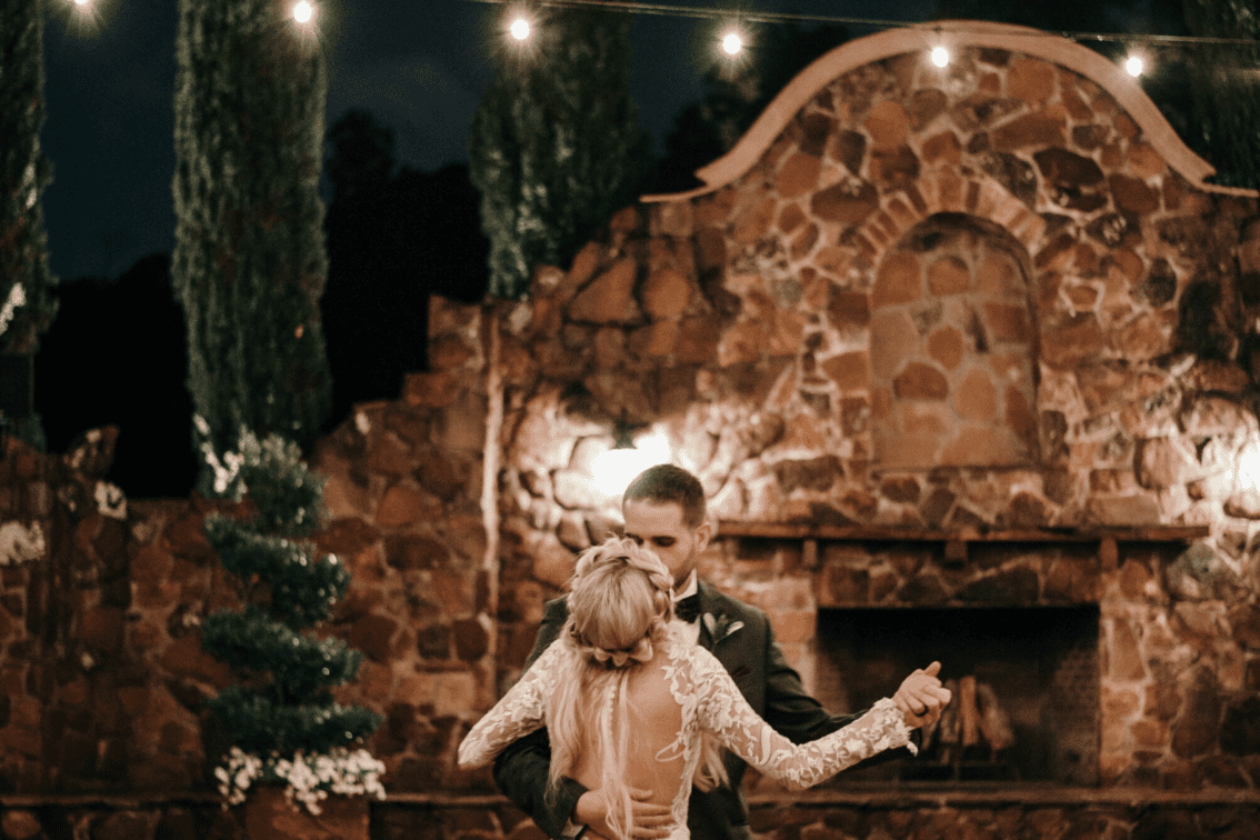 Wedding Dance in Front of Grand Fireplace